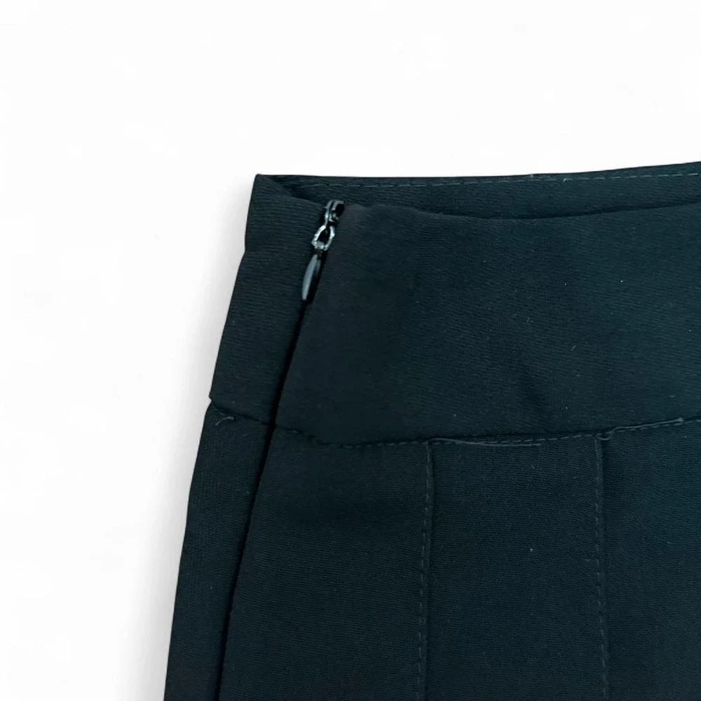 Black pleated mini skirt in size M